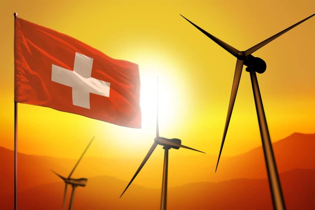 Schweizer Flagge und Windenergie.