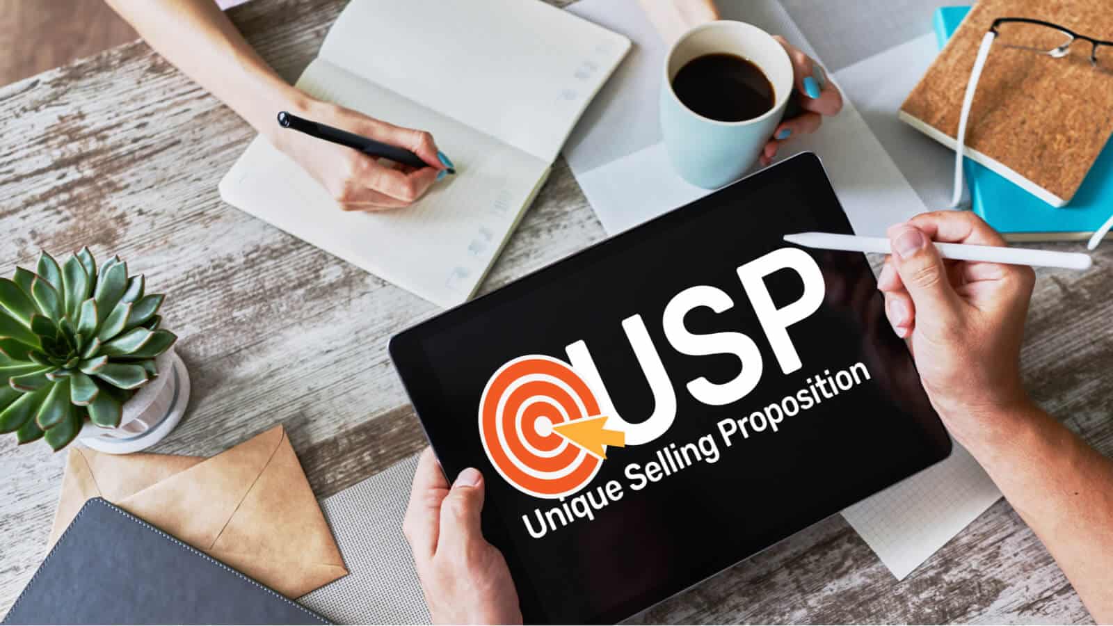 Ein iPad auf dem USP steht, unique selling proposition, was das Alleinstellungsmerkmal einer Firma oder eines Produktes bezeichnet